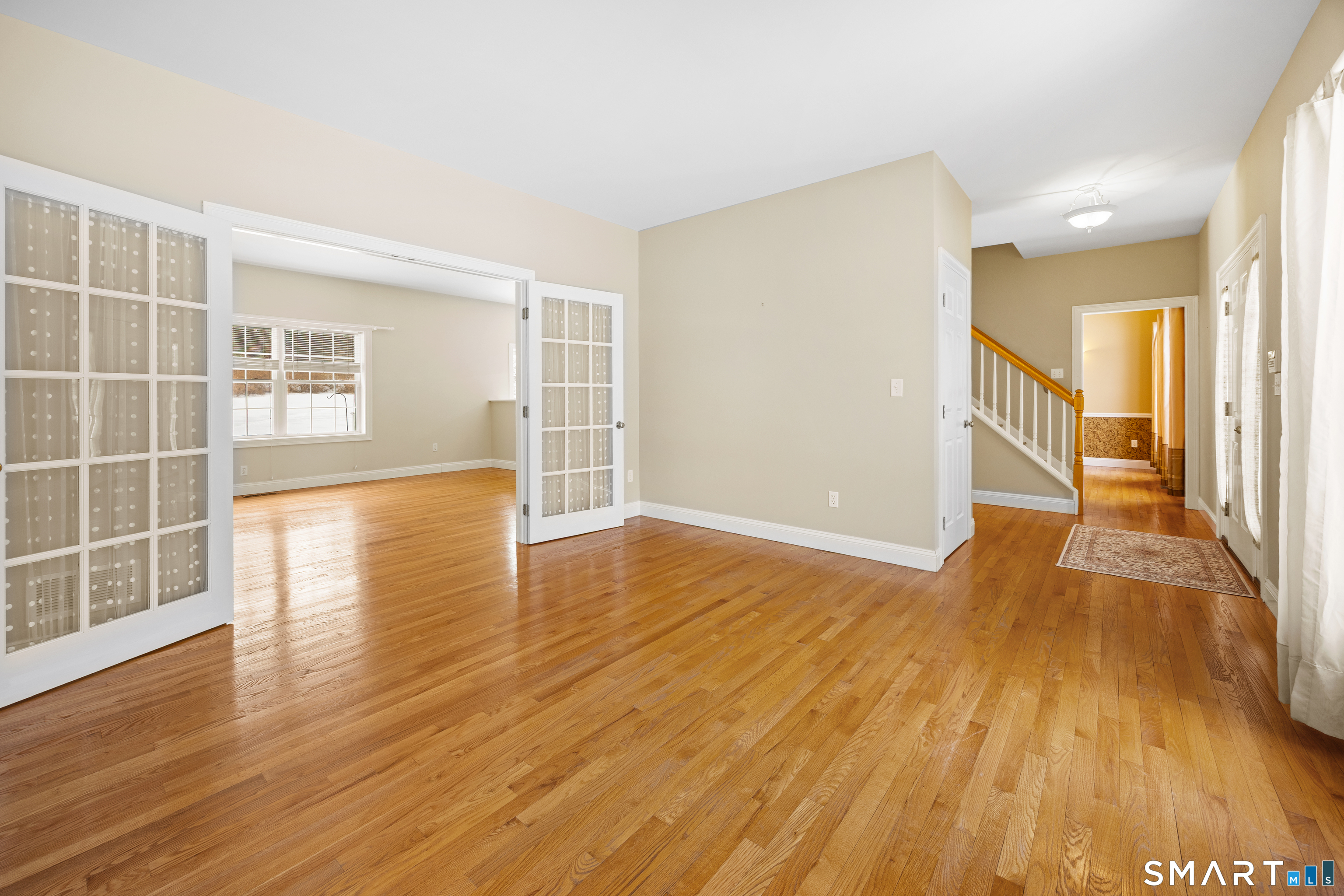 11 Nature Trail Hamden, CT 06518 - Photo 13 of 28 wooden floor in an empty room with a window