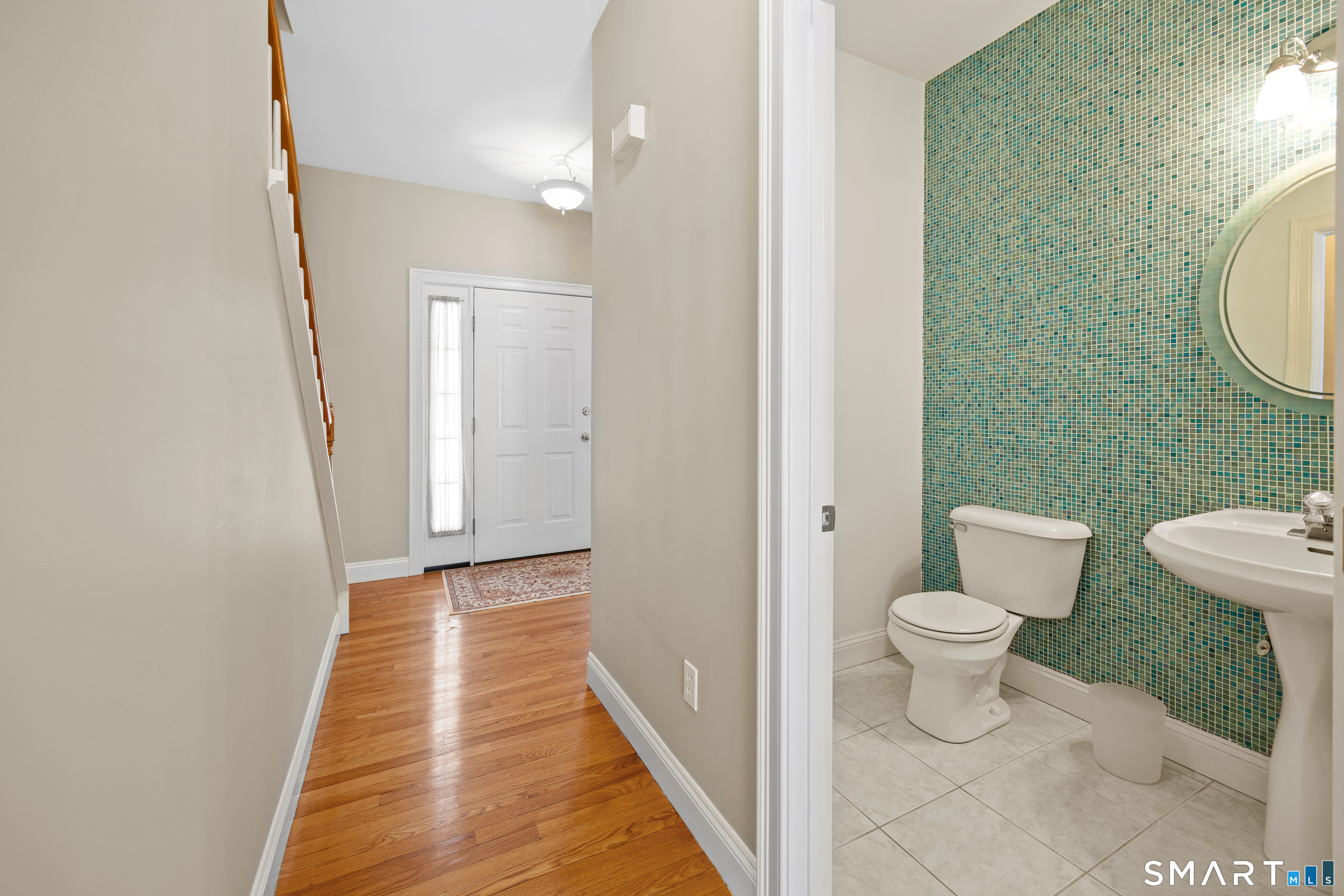 11 Nature Trail Hamden, CT 06518 - Photo 15 of 28 a bathroom with a toilet and a mirror