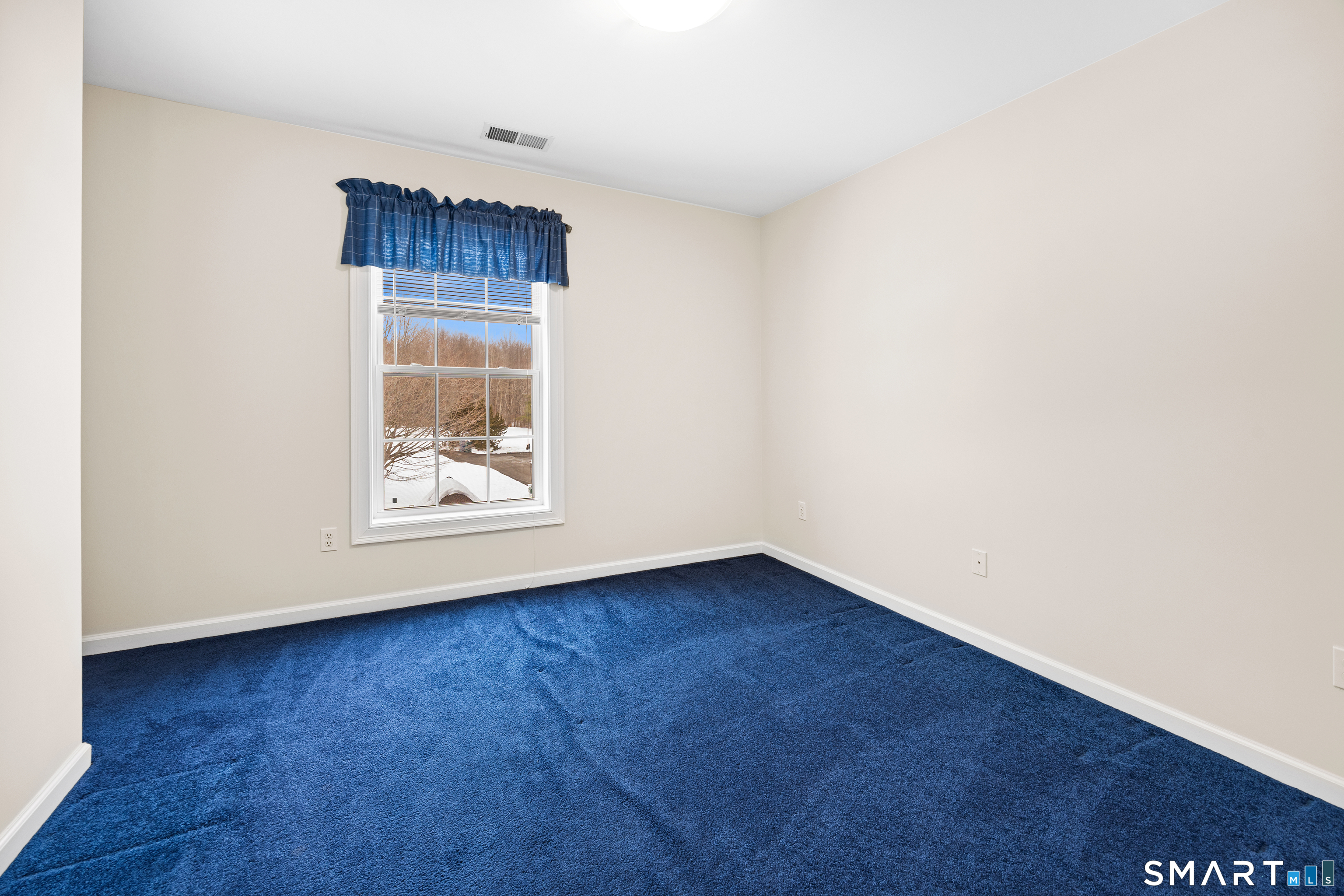 11 Nature Trail Hamden, CT 06518 - Photo 20 of 28 an empty room with wooden floor and window