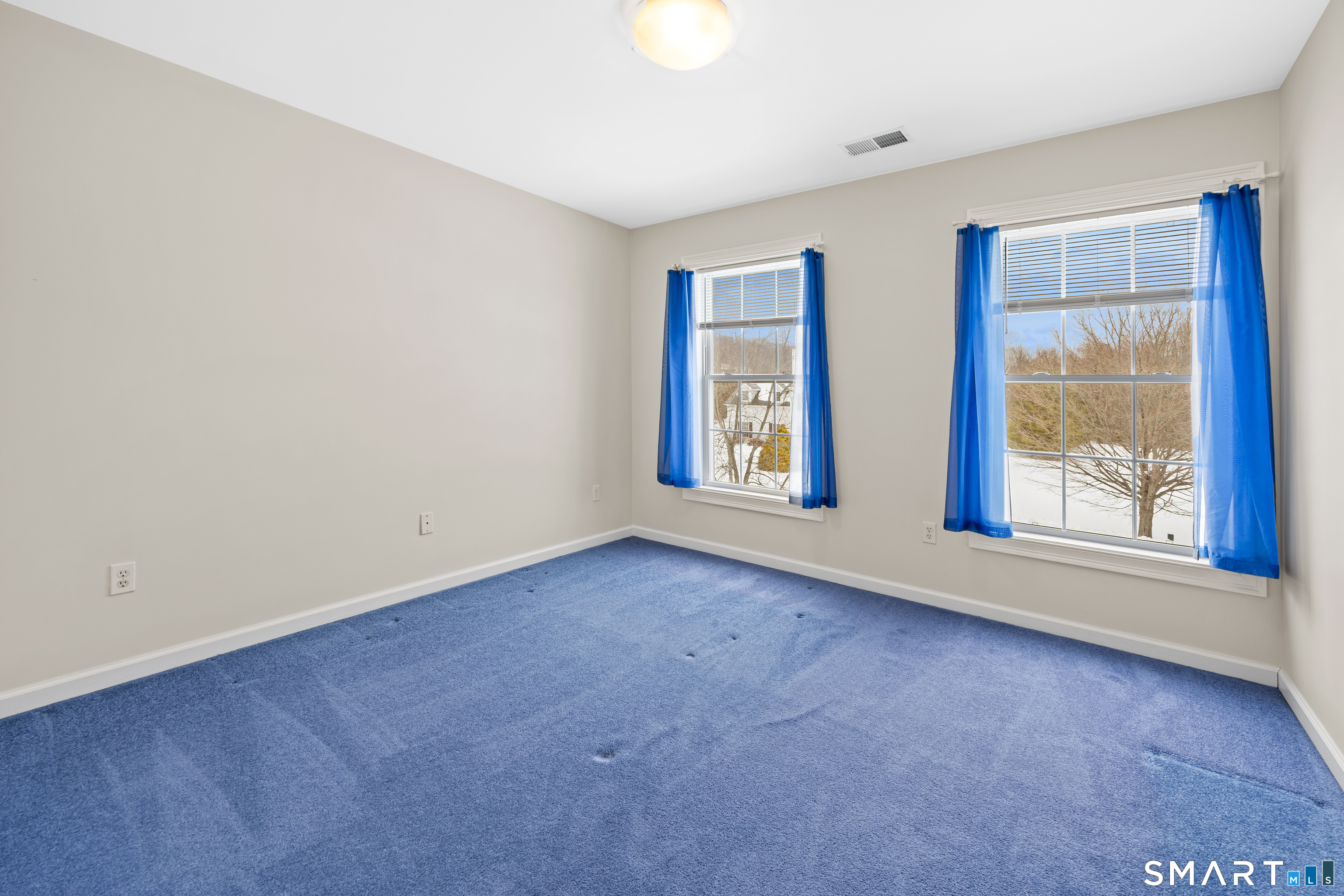 11 Nature Trail Hamden, CT 06518 - Photo 22 of 28 an empty room with windows and closet