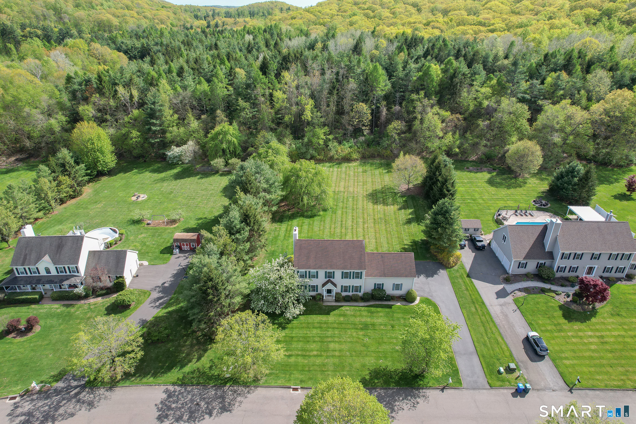 11 Nature Trail Hamden, CT 06518 - Photo 3 of 34 an aerial view of a house with a garden