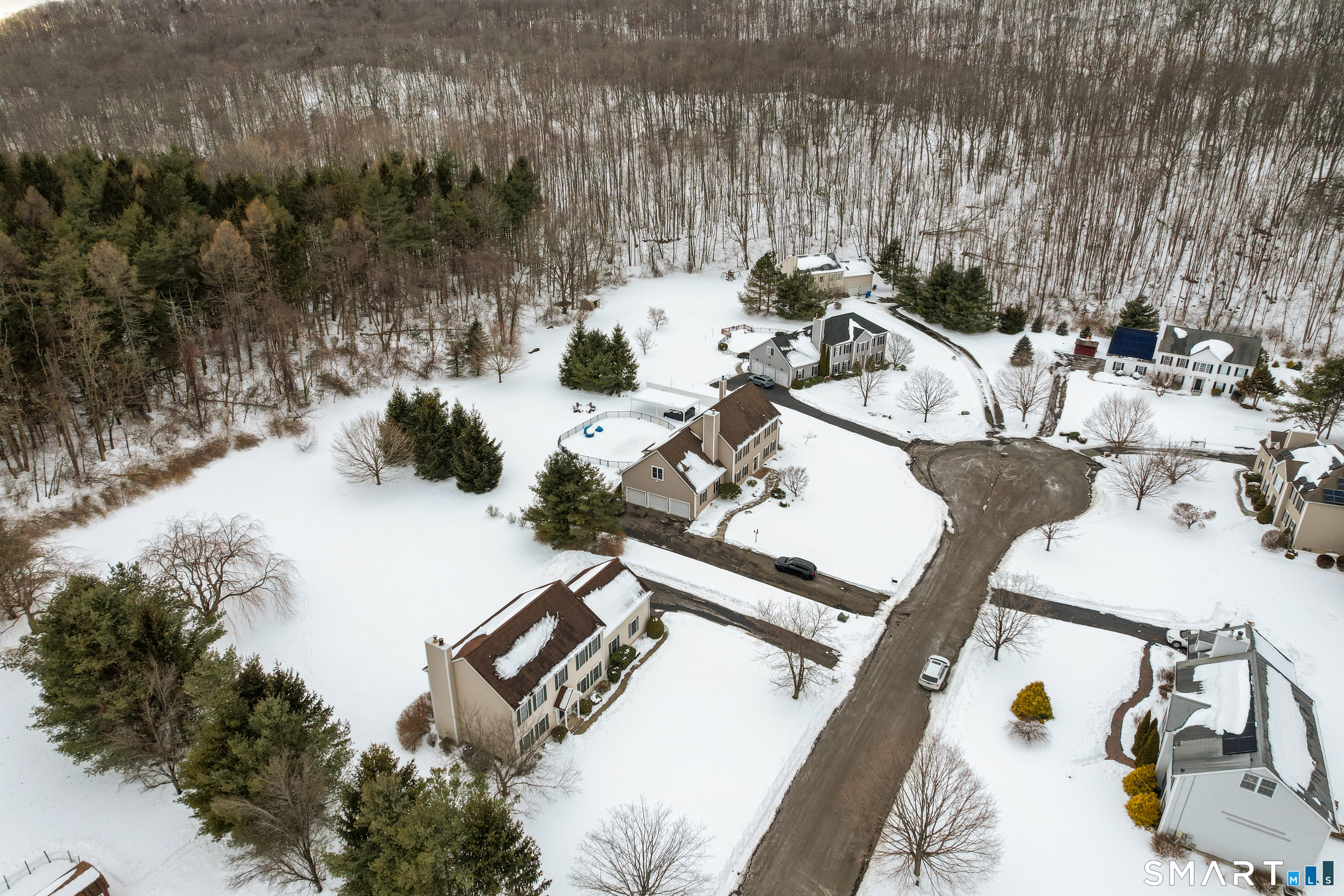 11 Nature Trail Hamden, CT 06518 - Photo 3 of 28 a view of a backyard with sitting area