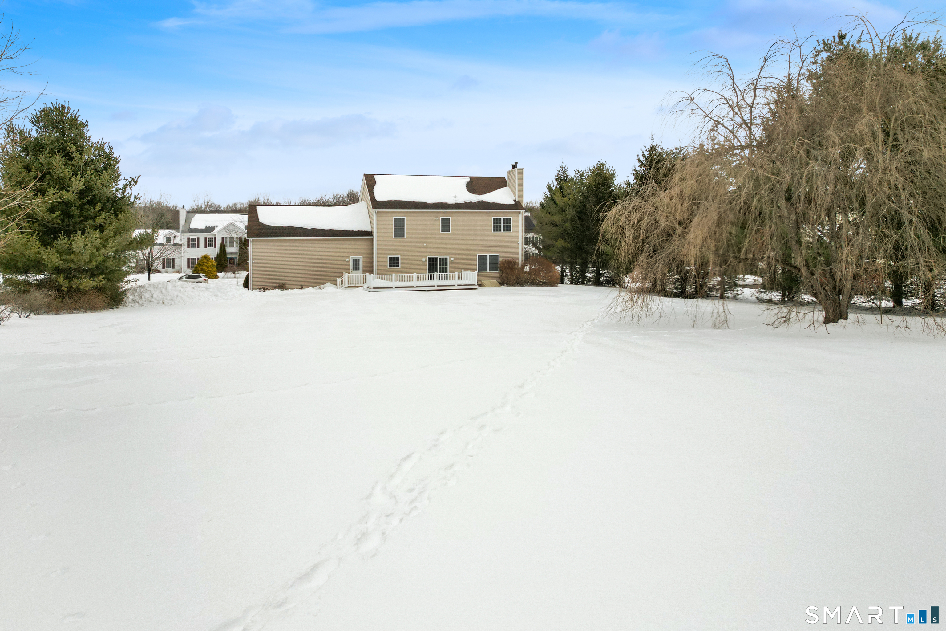 11 Nature Trail Hamden, CT 06518 - Photo 5 of 28 a view of a house with a snow on the road