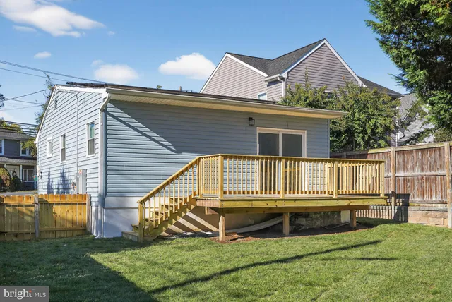a view of a house with a small yard