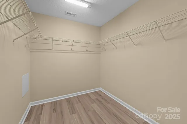 a view of a room with racks on the wall