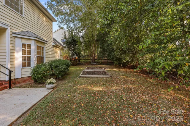 a view of backyard with green space