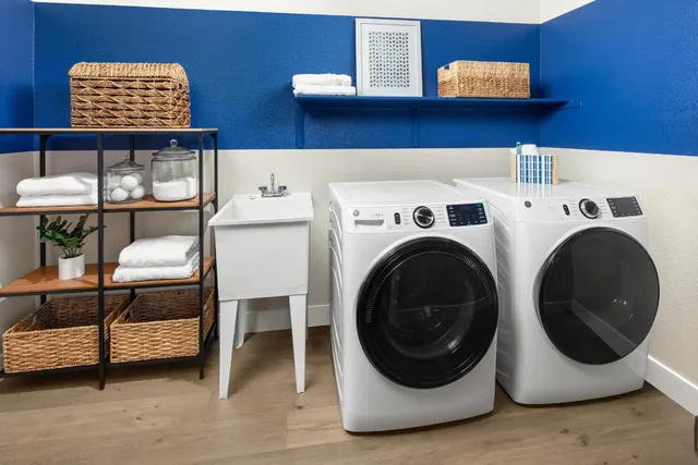 a utility room with dryer and washer