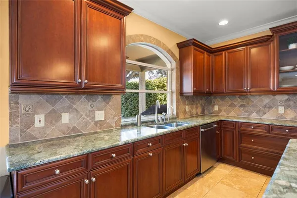 a bedroom with a large bed and a couch