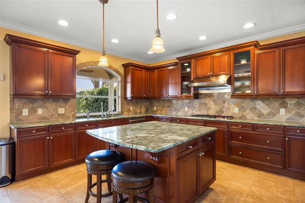a living room with furniture and a painting