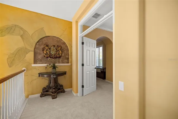 a living room with fireplace furniture and a window