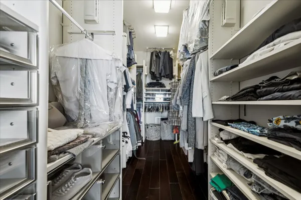 a kitchen with a stove and a refrigerator