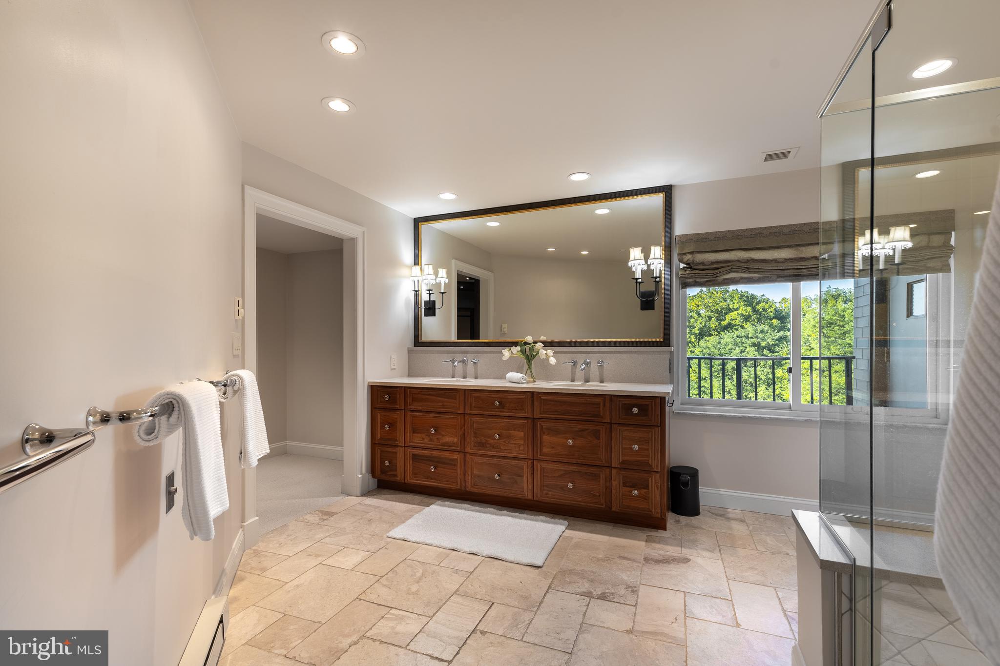 425 Windmere Drive, Unit 3B State College, PA 16801 - Photo 21 of 42 a bathroom with a sink mirror and tub