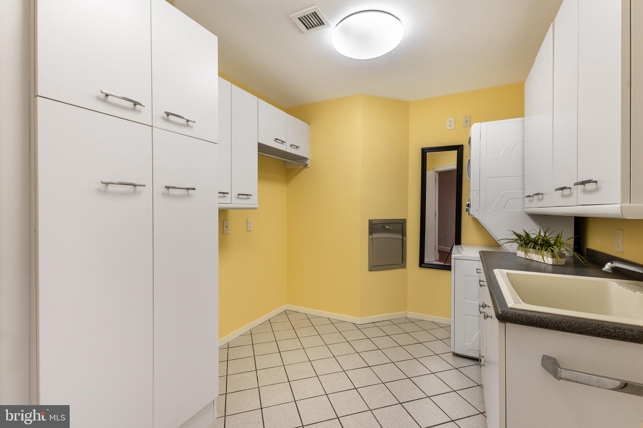 425 Windmere Drive, Unit 3B State College, PA 16801 - Photo 25 of 42 a bathroom with a sink a toilet and mirror