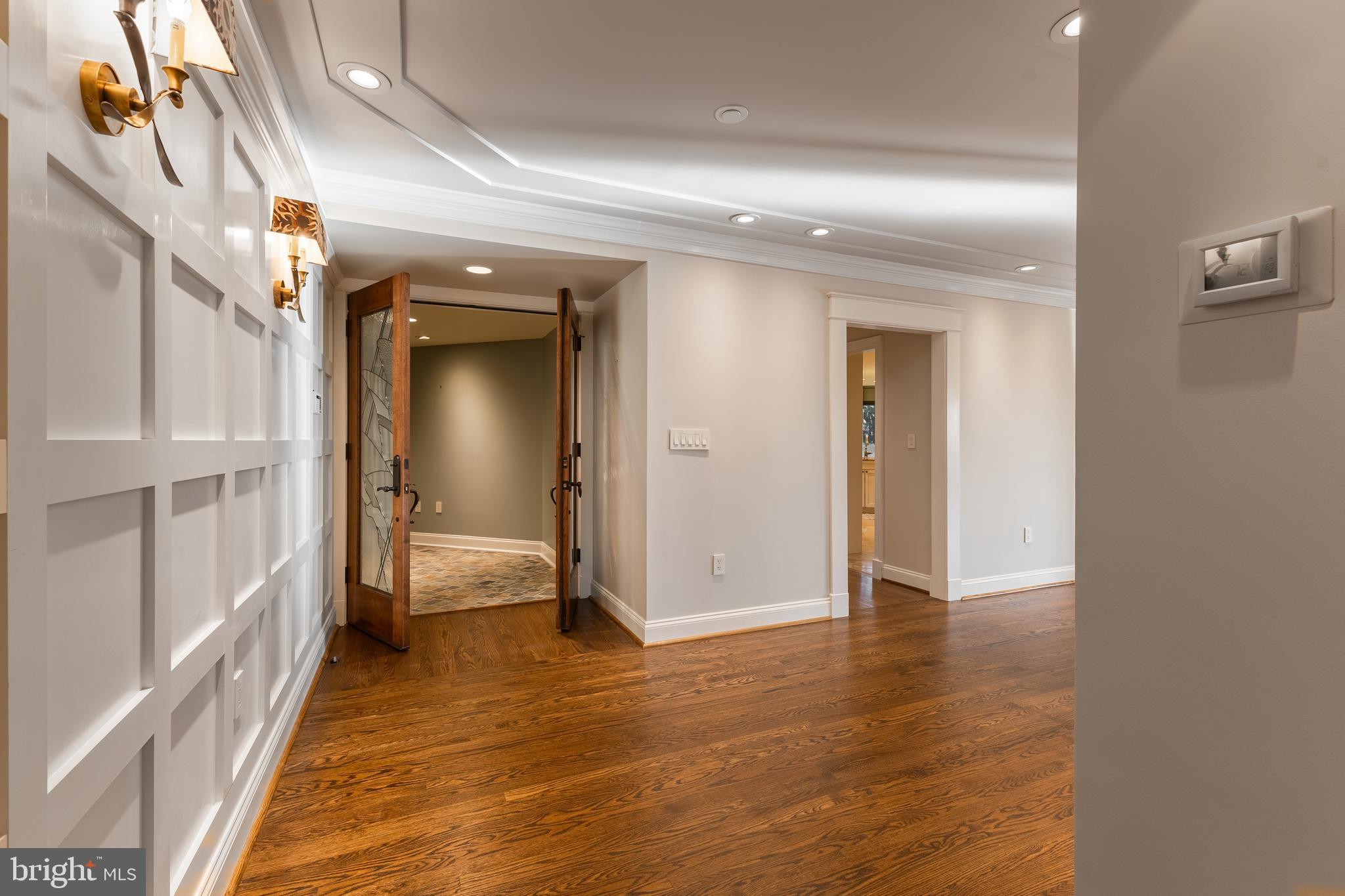 425 Windmere Drive, Unit 3B State College, PA 16801 - Photo 5 of 42 a view of a livingroom with tub and door