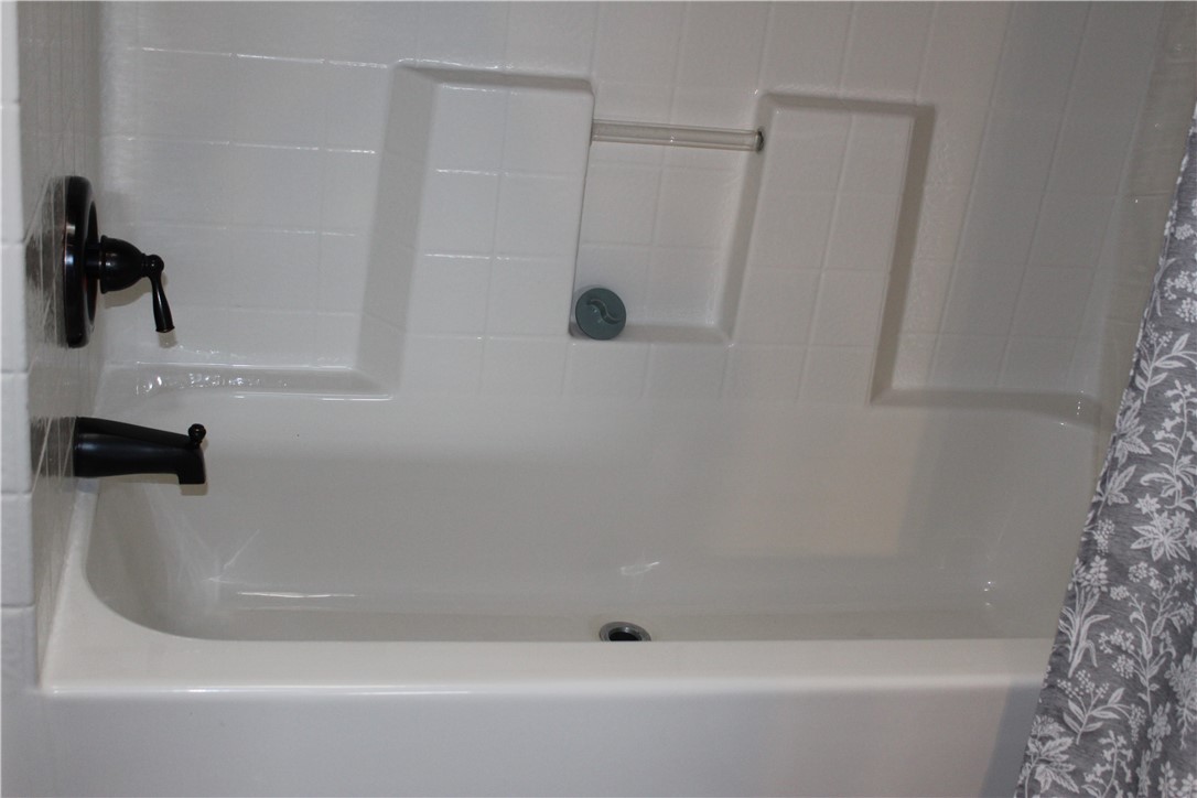 125 Lagarto Ferry Mathis, TX 78368 - Photo 19 of 38 a bathroom with a shower
