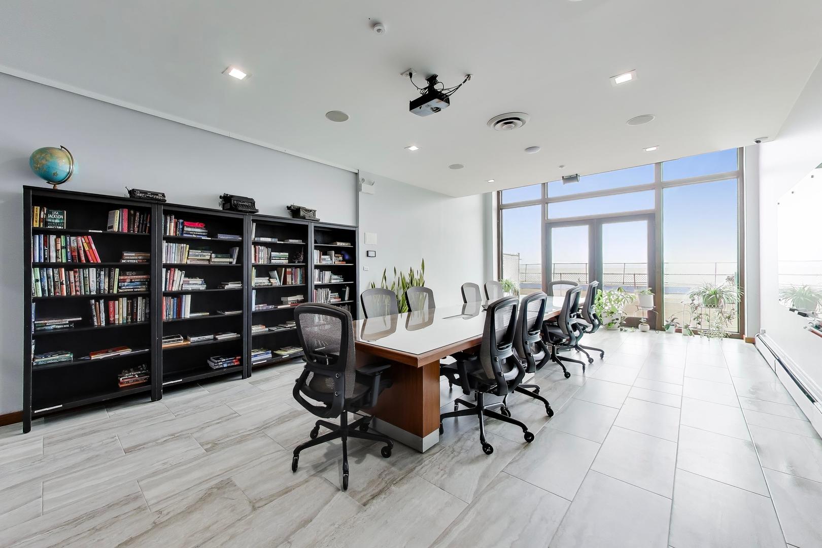 6325 North Sheridan Road, Unit 1602 Chicago, IL 60660 - Photo 30 of 38 a view of a workspace with furniture and lounge chair