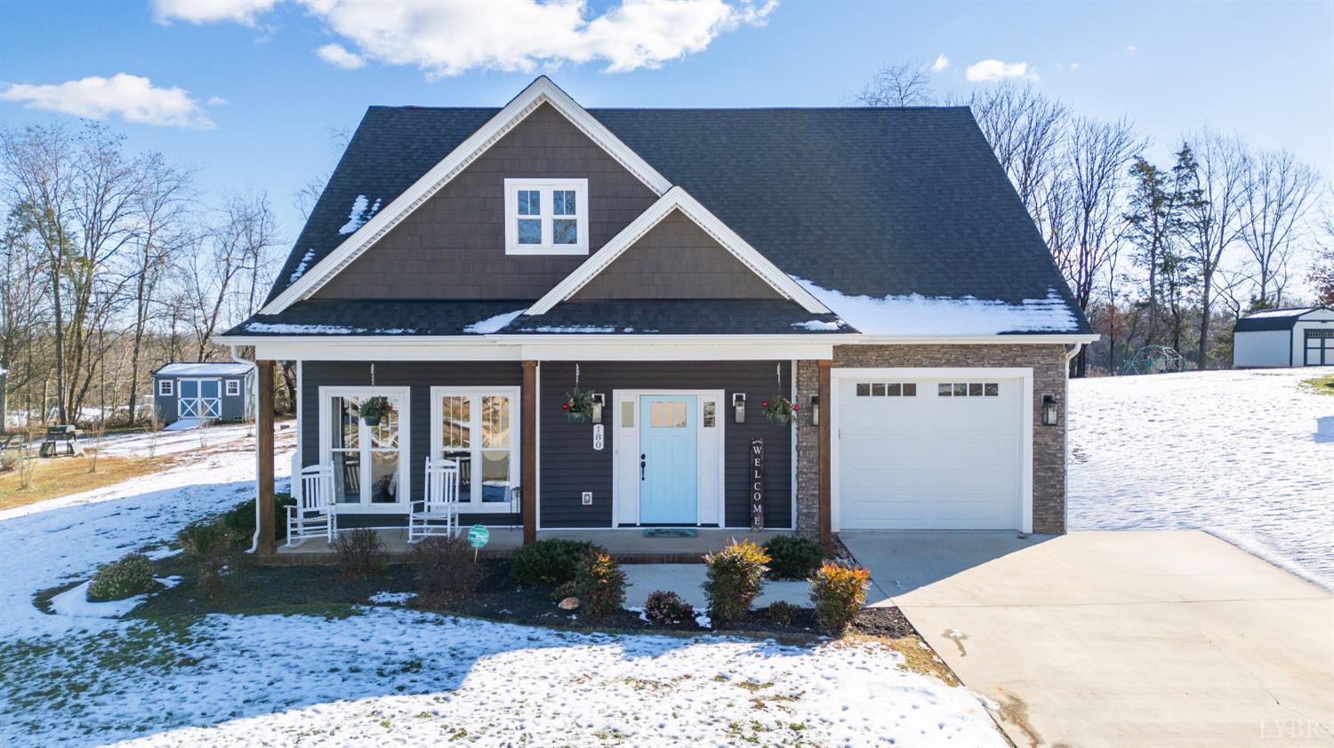180 Timber Ridge Drive Forest, VA 24551 - Photo 1 of 58 a front view of a house with garden
