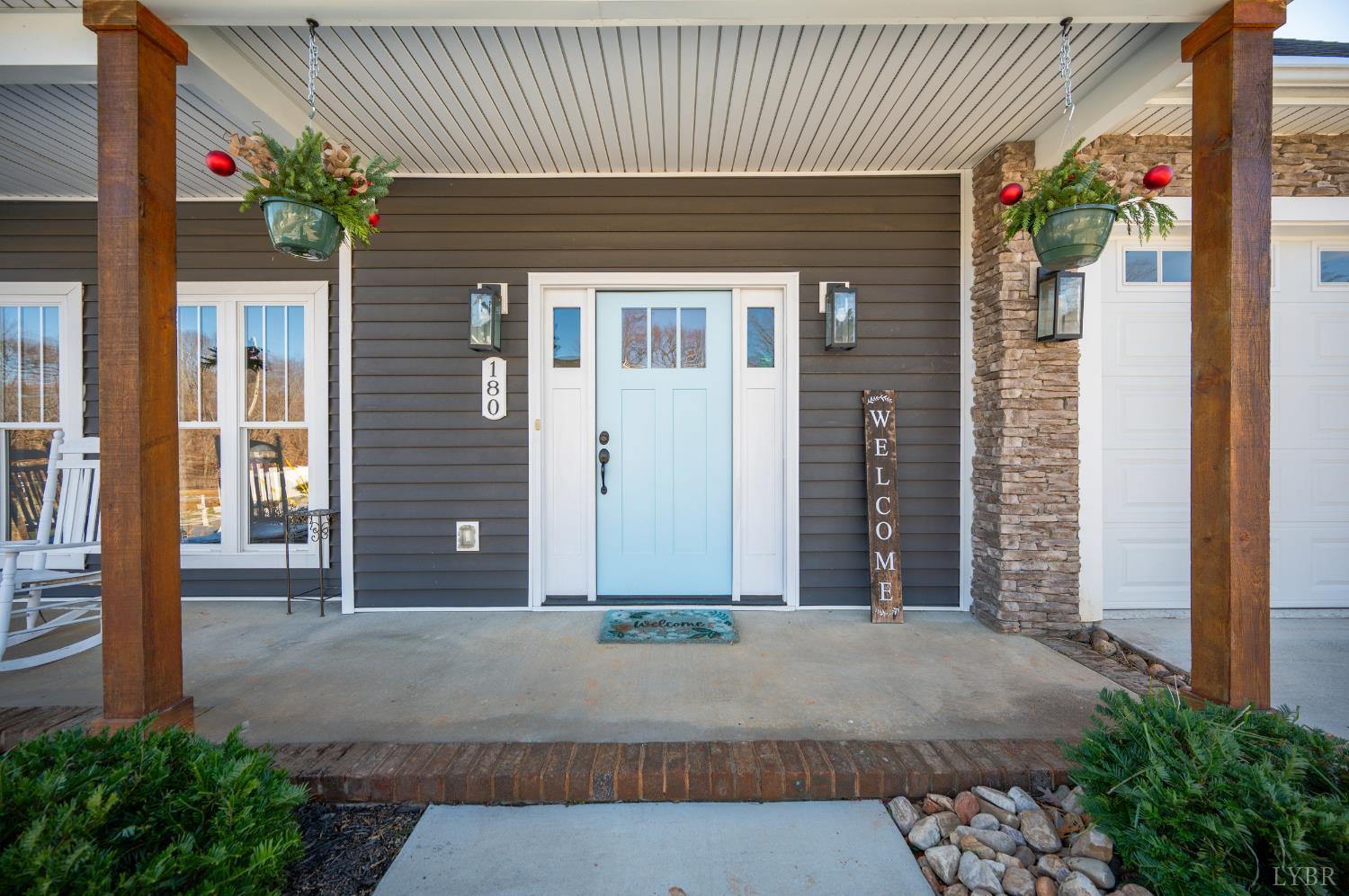 180 Timber Ridge Drive Forest, VA 24551 - Photo 2 of 58 a front view of a house with a yard