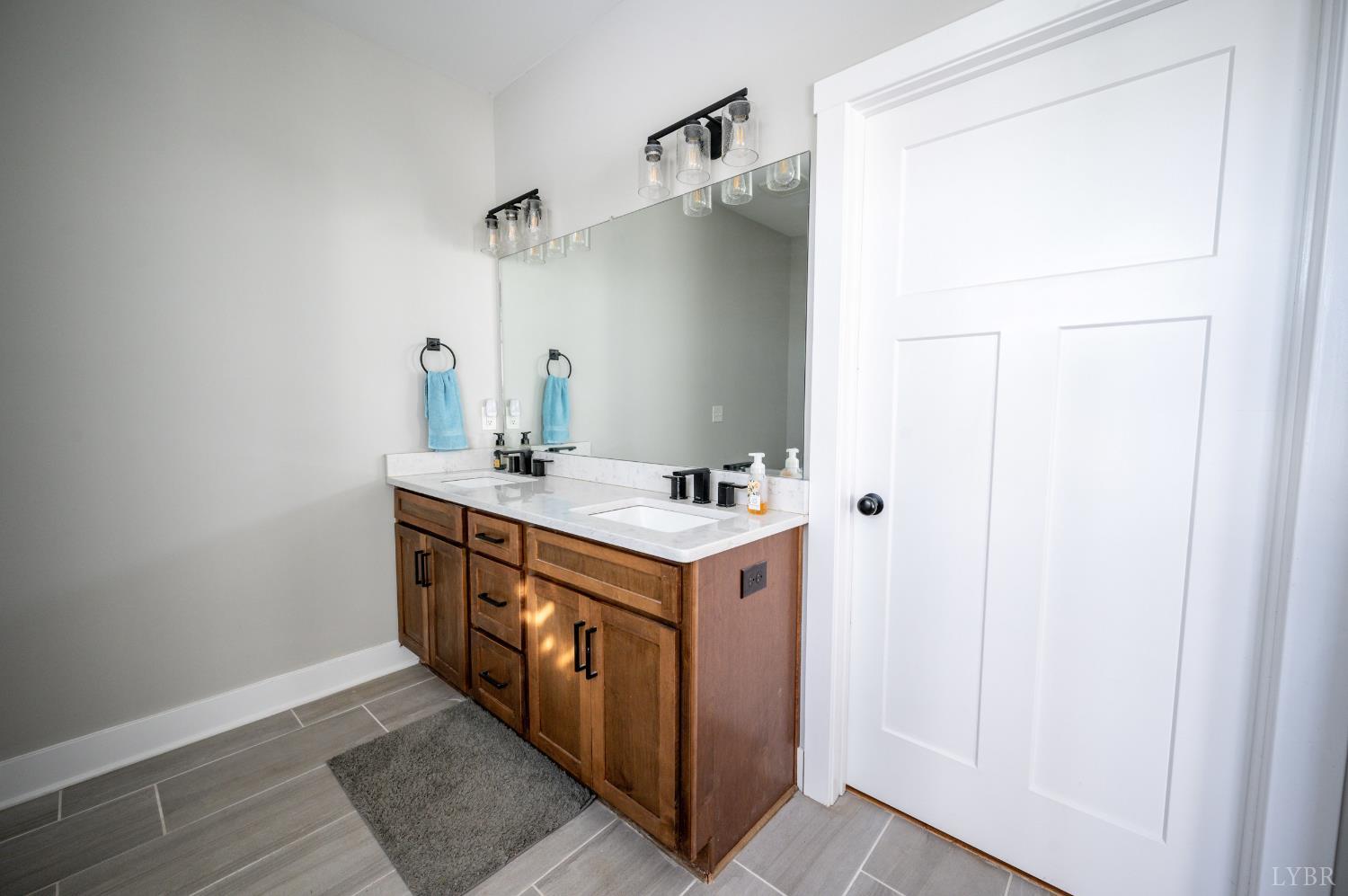 180 Timber Ridge Drive Forest, VA 24551 - Photo 22 of 58 a utility room with cabinets washer and dryer