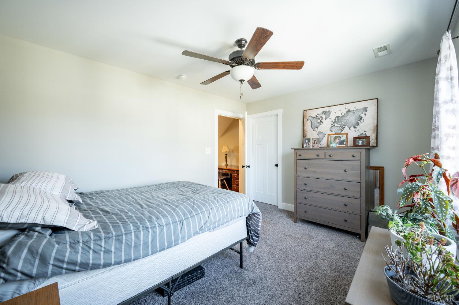 180 Timber Ridge Drive Forest, VA 24551 - Photo 39 of 58 a bedroom with a bed and a ceiling fan