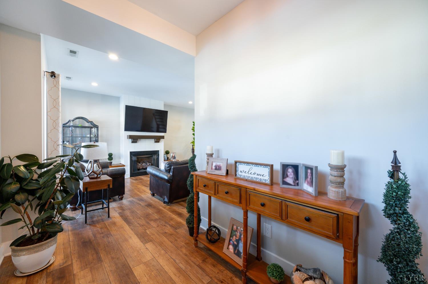 180 Timber Ridge Drive Forest, VA 24551 - Photo 4 of 58 a living room with furniture and a wooden floor