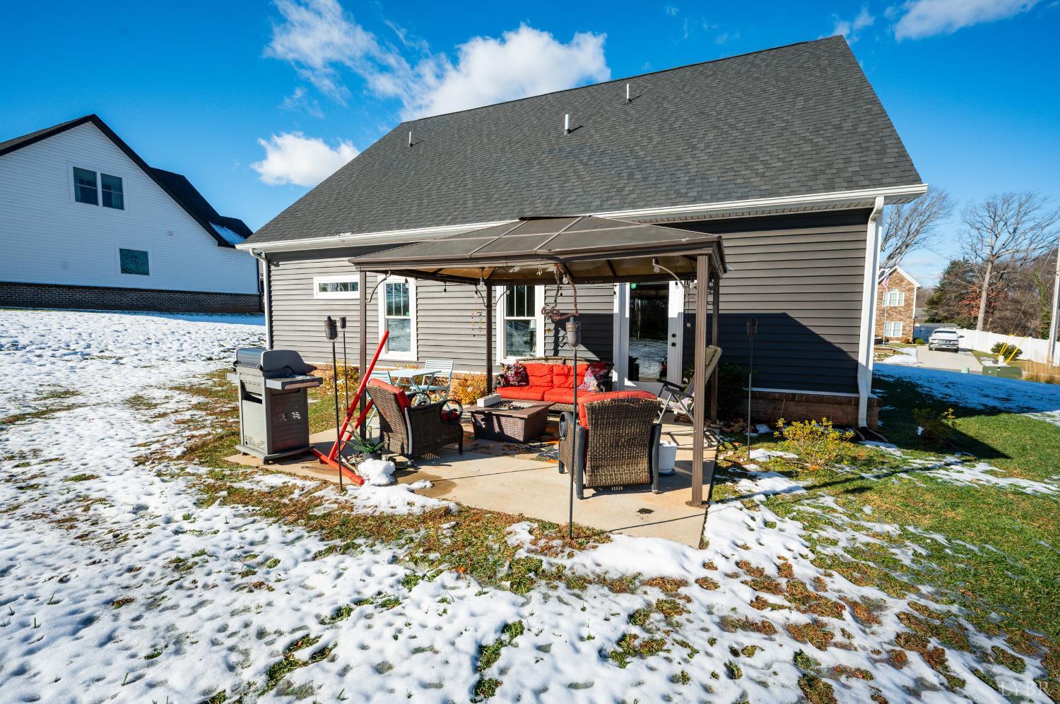 180 Timber Ridge Drive Forest, VA 24551 - Photo 50 of 58 a view of a chairs and tables in patio