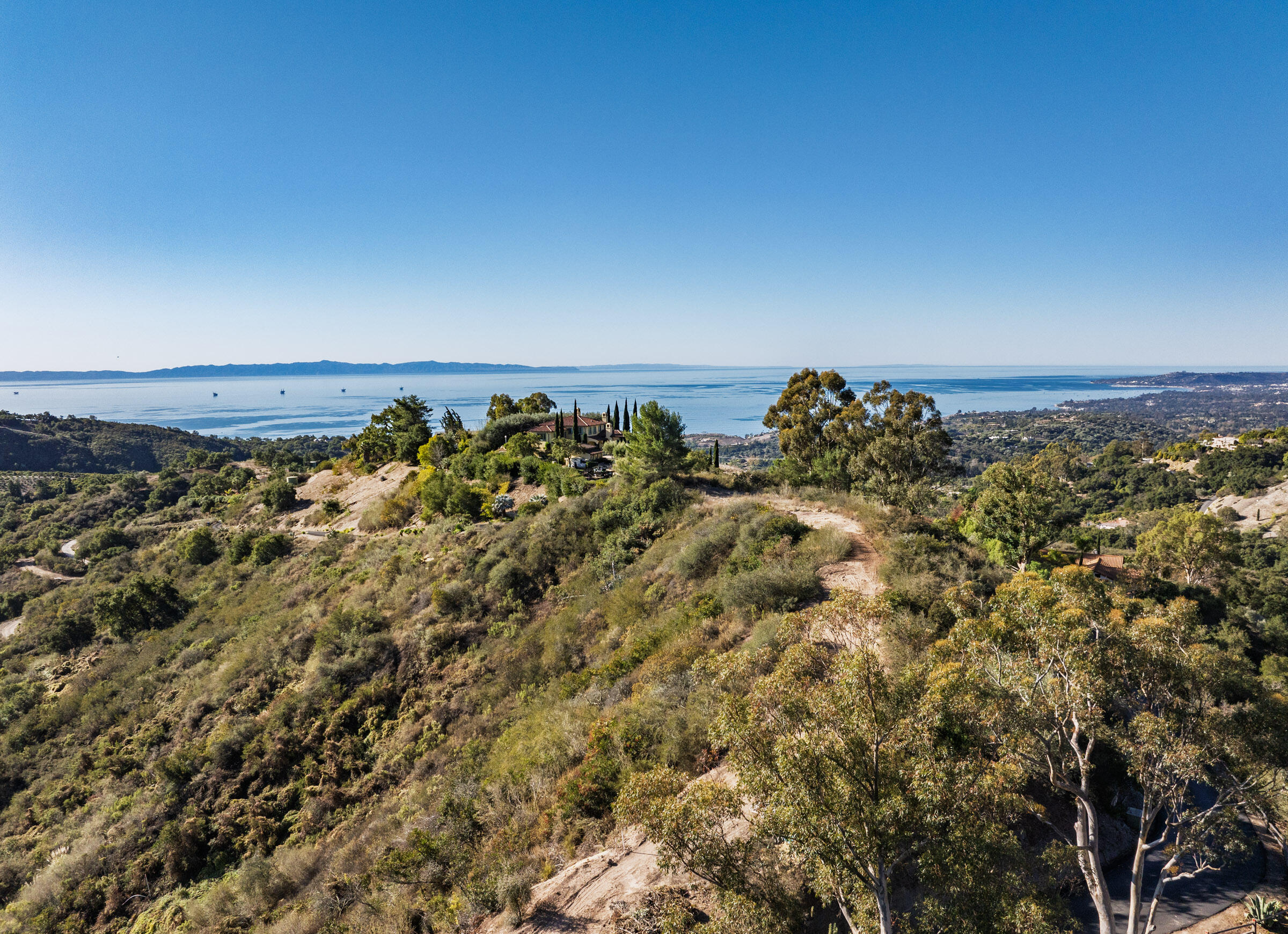 838 Toro Canyon Road Santa Barbara, CA 93108 - Photo 16 of 28 a view of a large body of water with a building in back