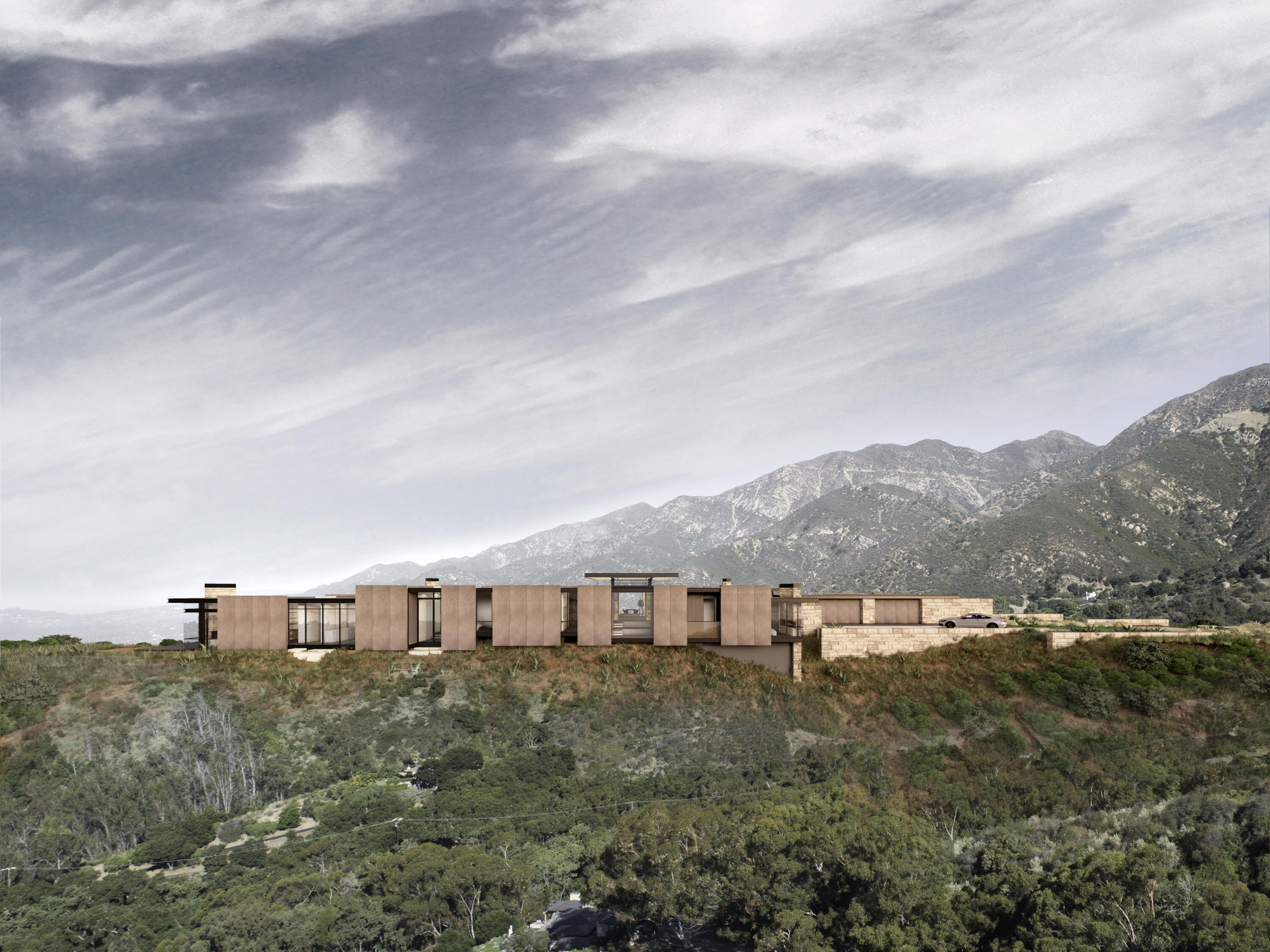 838 Toro Canyon Road Santa Barbara, CA 93108 - Photo 21 of 28 a view of a big house with a mountain in the background