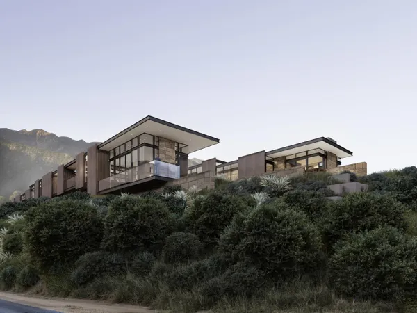 a view of a house with a mountain in the background