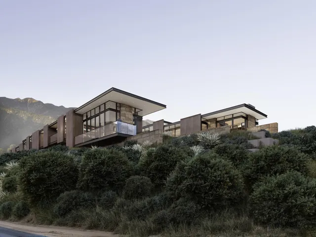 a view of a house with a mountain in the background