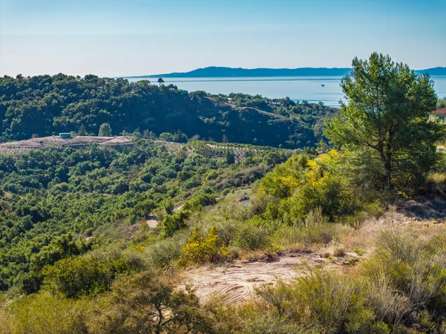 a view of lake and mountain