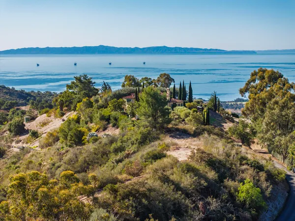 front view of a house with a big yard