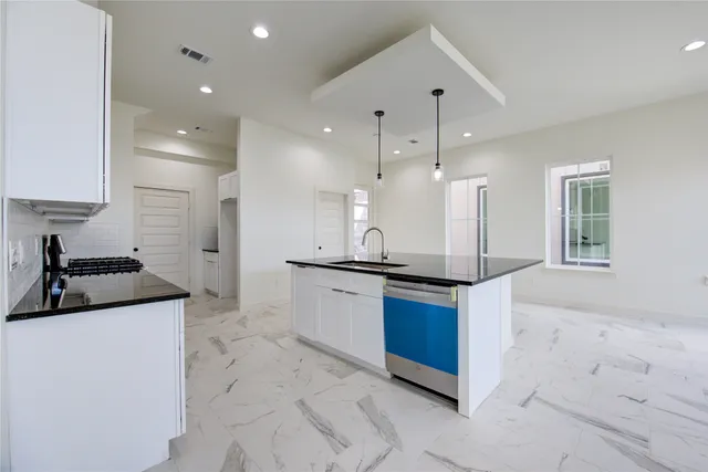 a view of an entryway with front door