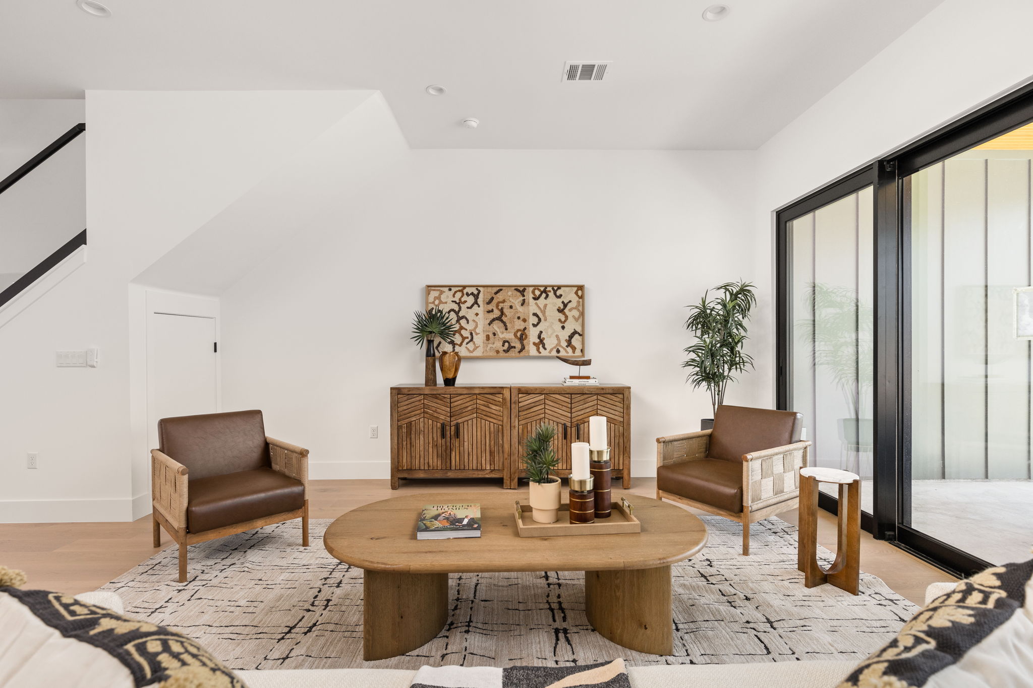 1610 Harvey Street, Unit 2 Austin, TX 78702 - Photo 10 of 38 Sitting room featuring wood finished floors and recessed lighting