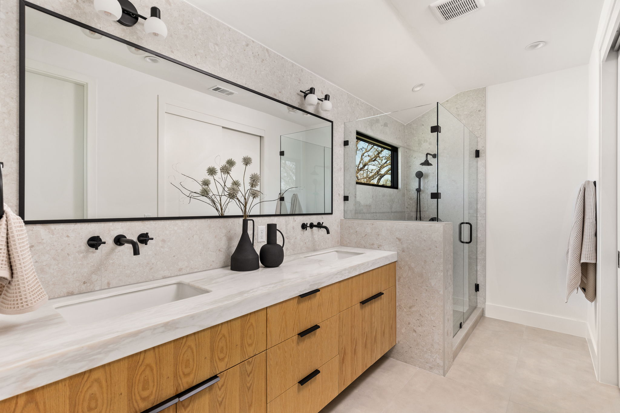 1610 Harvey Street, Unit 2 Austin, TX 78702 - Photo 22 of 39 a bathroom with a double vanity sink and mirror