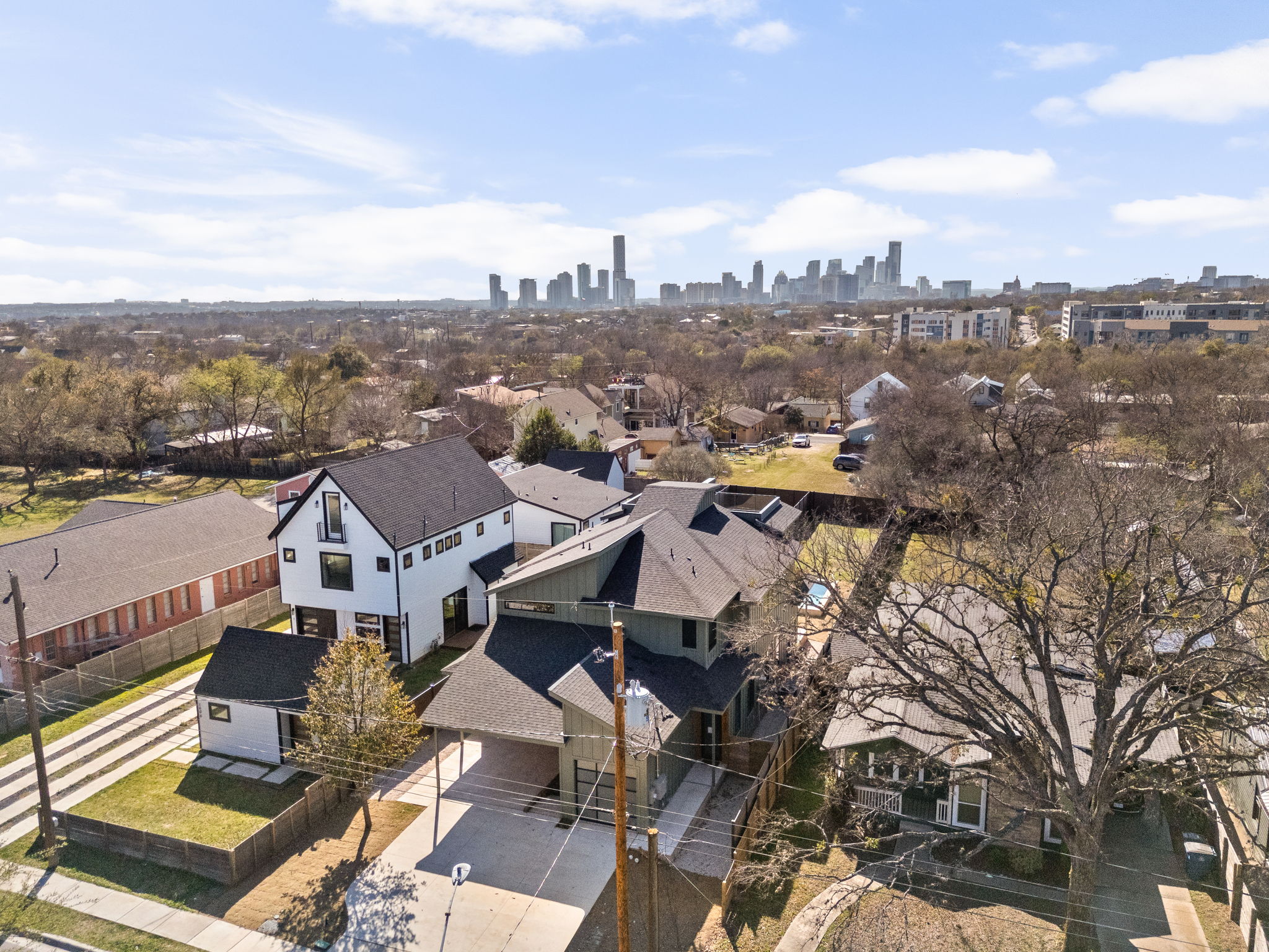 1610 Harvey Street, Unit 2 Austin, TX 78702 - Photo 30 of 38 Aerial view of residential area with skyline