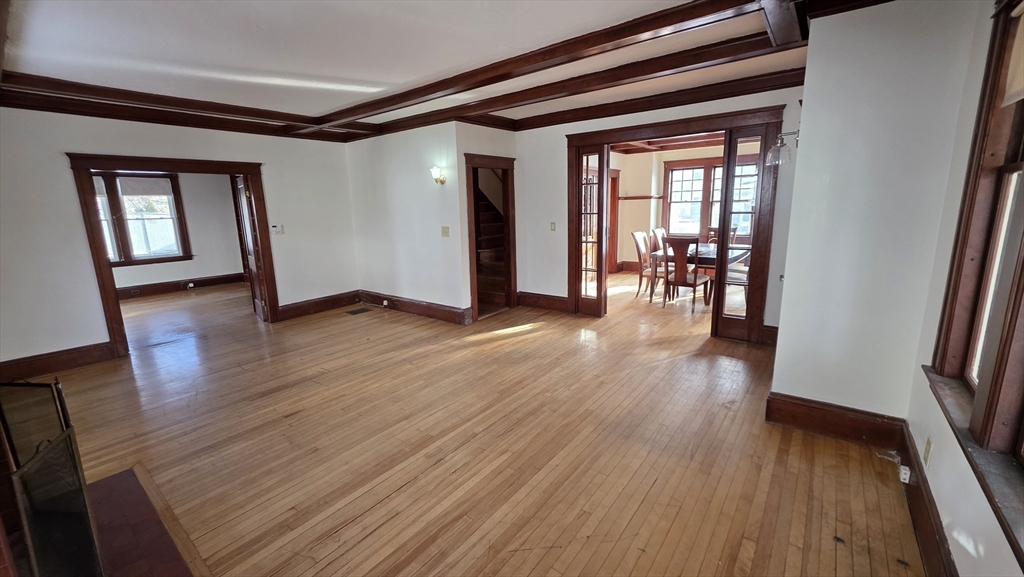 46 Wachusett Street Worcester, MA 01609 - Photo 11 of 42 a view of empty room with wooden floor and fan