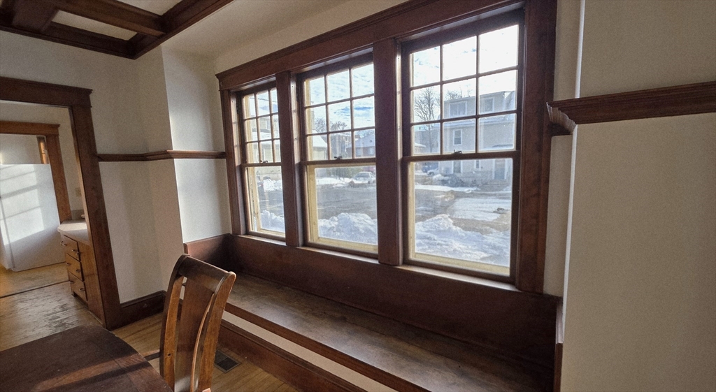 46 Wachusett Street Worcester, MA 01609 - Photo 15 of 42 a view of an empty room with wooden floor and a window