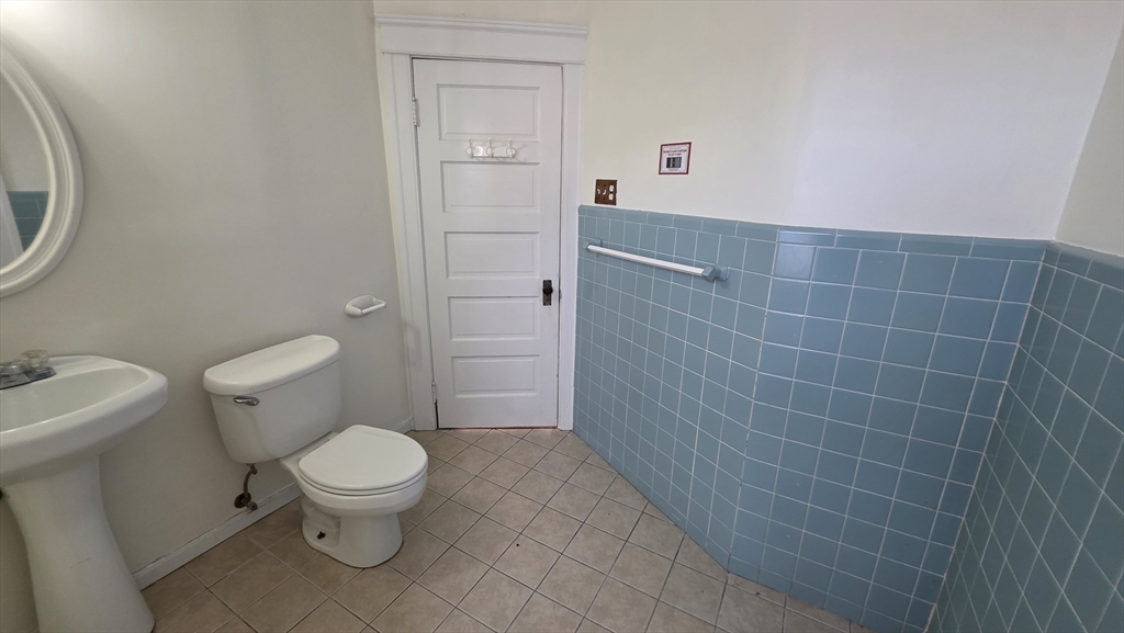 46 Wachusett Street Worcester, MA 01609 - Photo 29 of 42 a bathroom with a toilet and a shower