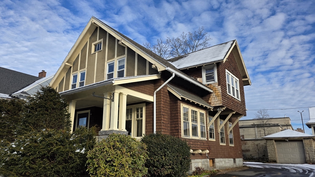 46 Wachusett Street Worcester, MA 01609 - Photo 3 of 42 a view of a house with brick walls and plants