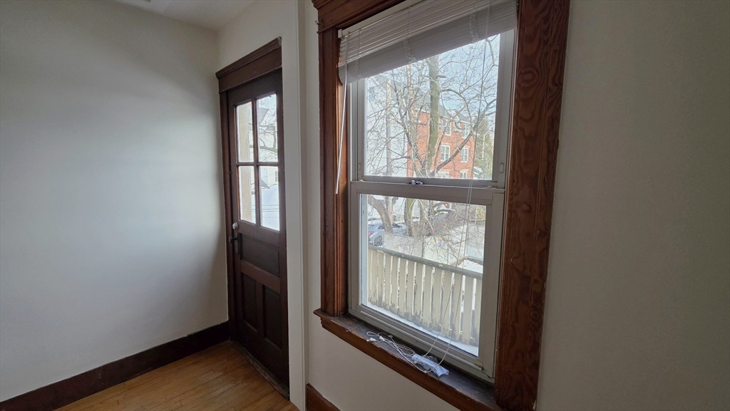 46 Wachusett Street Worcester, MA 01609 - Photo 35 of 42 a view of an empty room and wooden floor