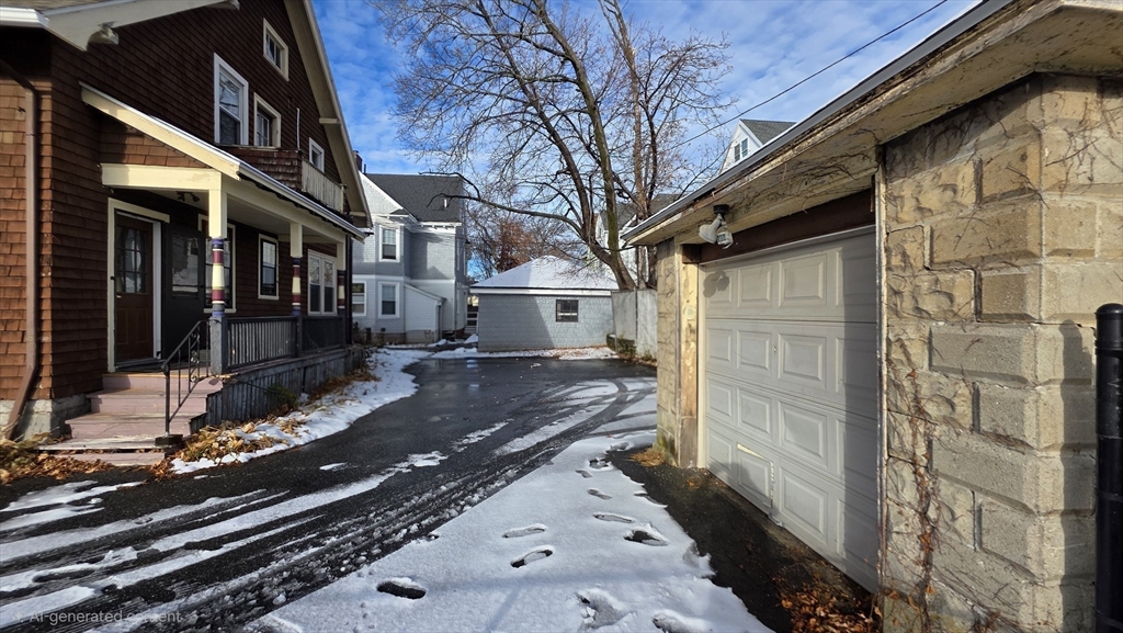 46 Wachusett Street Worcester, MA 01609 - Photo 41 of 42 a view of a house with a wooden fence