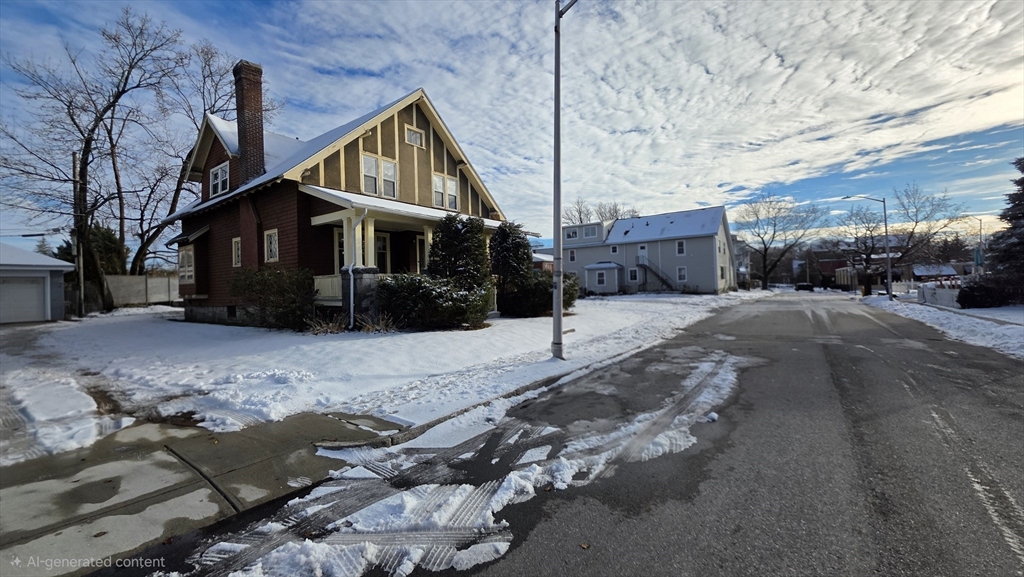46 Wachusett Street Worcester, MA 01609 - Photo 5 of 42 a front view of a house with a yard