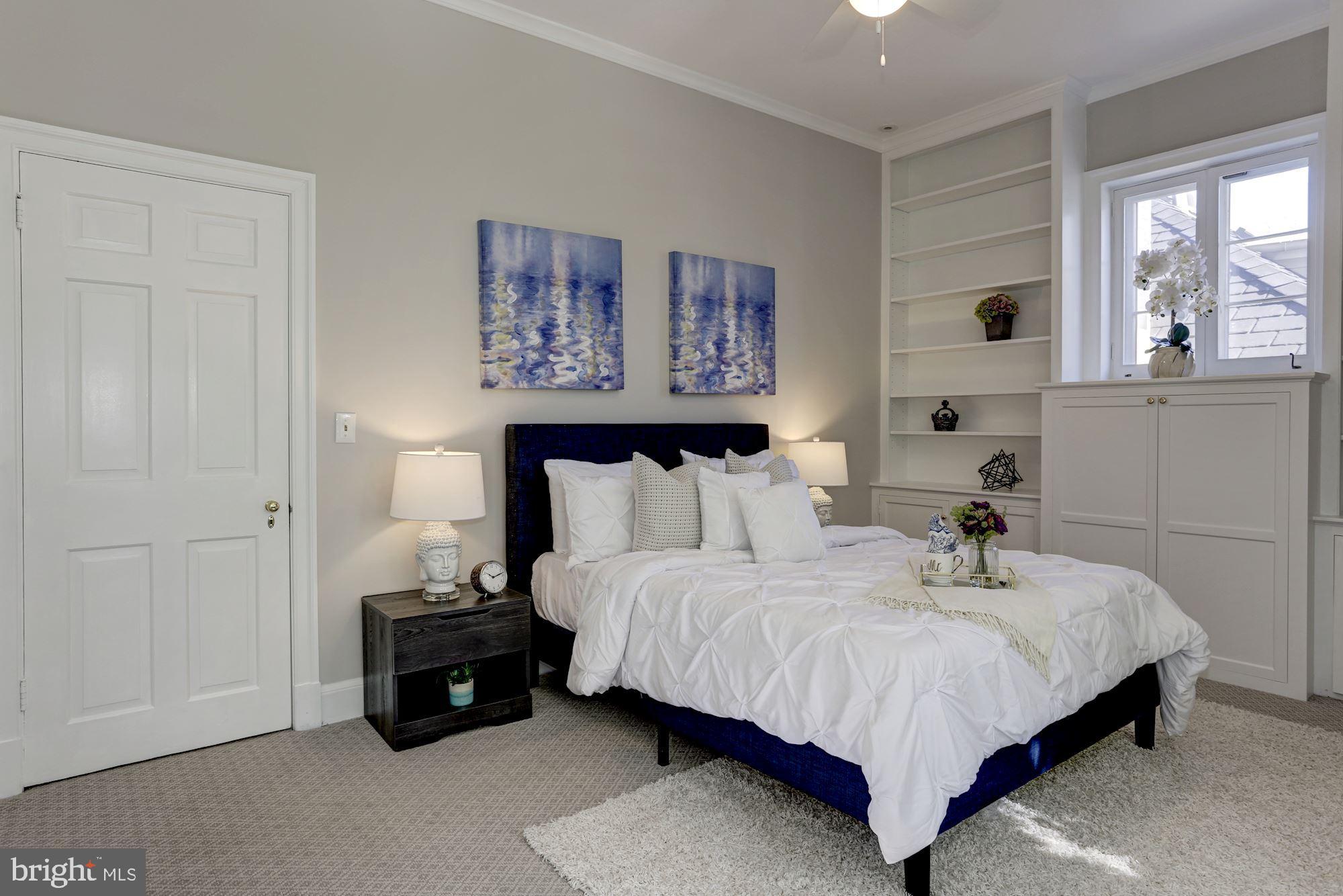 3306 R Street Northwest Washington, DC 20007 - Photo 12 of 24 a bedroom with bed and window