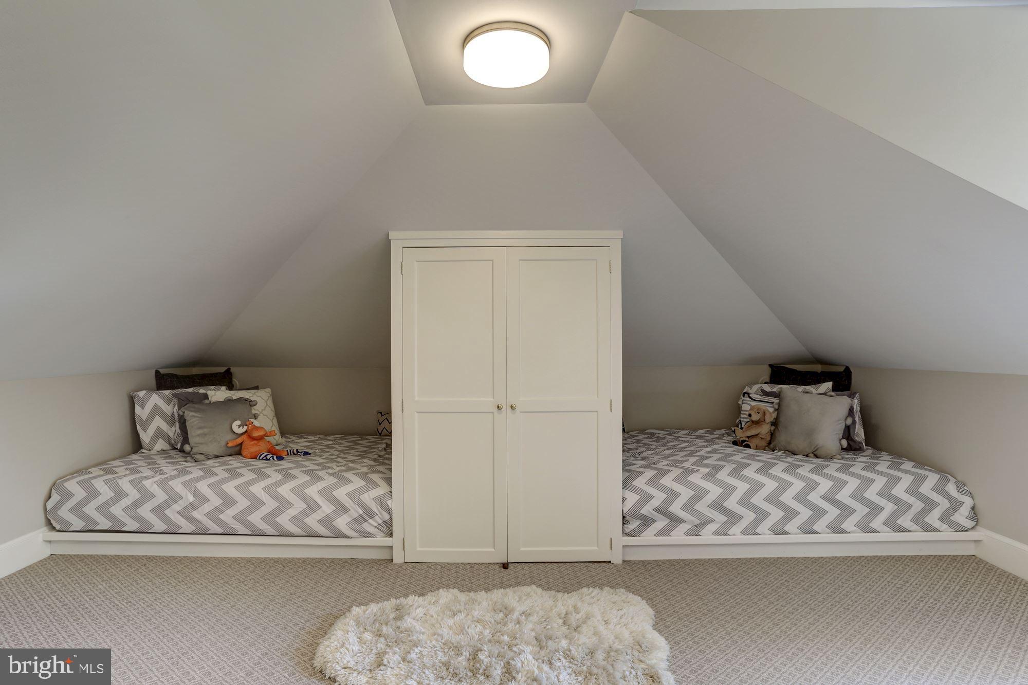 3306 R Street Northwest Washington, DC 20007 - Photo 15 of 24 a bedroom with a bed and hallway