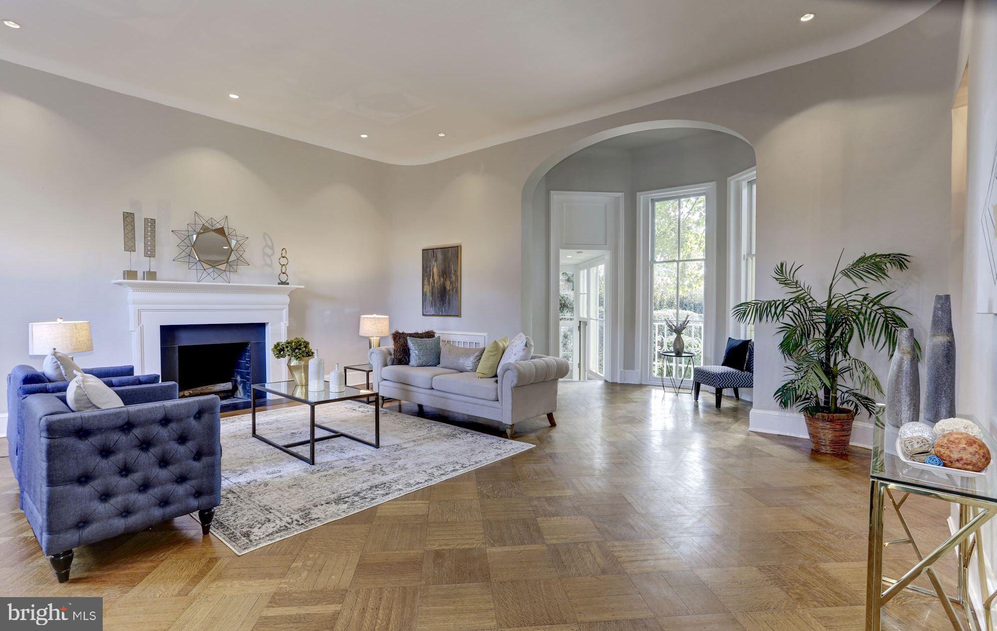 3306 R Street Northwest Washington, DC 20007 - Photo 5 of 24 a living room with furniture and a fireplace
