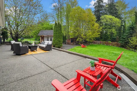 a wooden bench sitting in the middle of a park