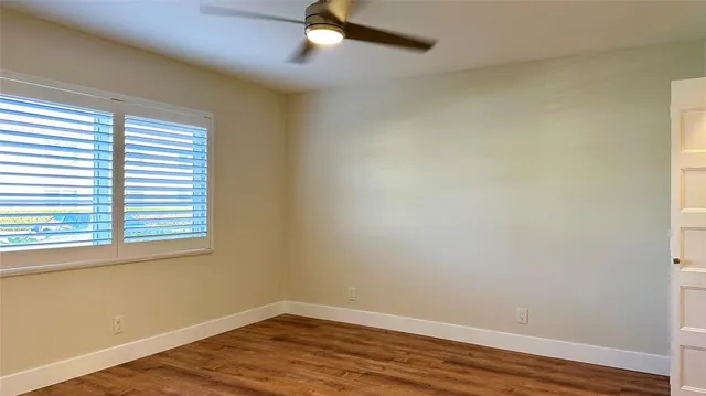 a bathroom with a toilet and shower
