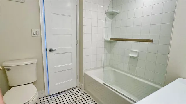 a view of a house with backyard porch and sitting area