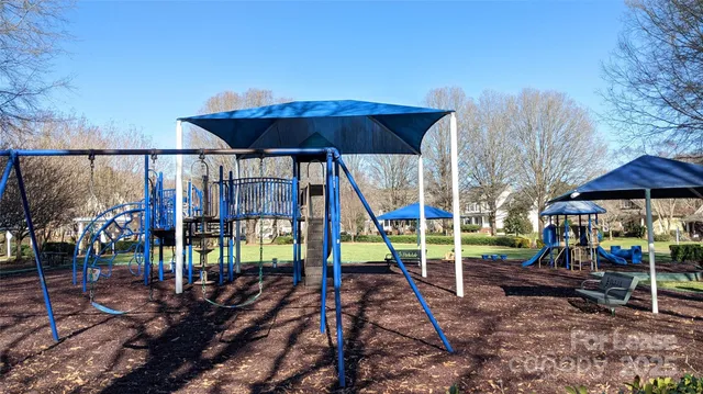 a view of a park with a slide